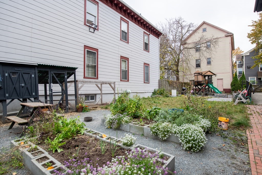 206 Smith Street Providence, RI 02908 - Photo 6 of 40 a view of a patio with table and chairs and potted plants