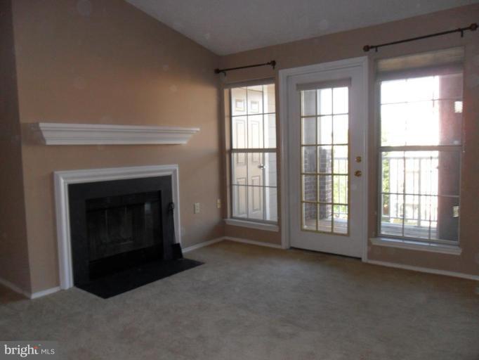 21013 Timber Ridge Terrace, Unit 301 Ashburn, VA 20147 - Photo 4 of 9 Living Room