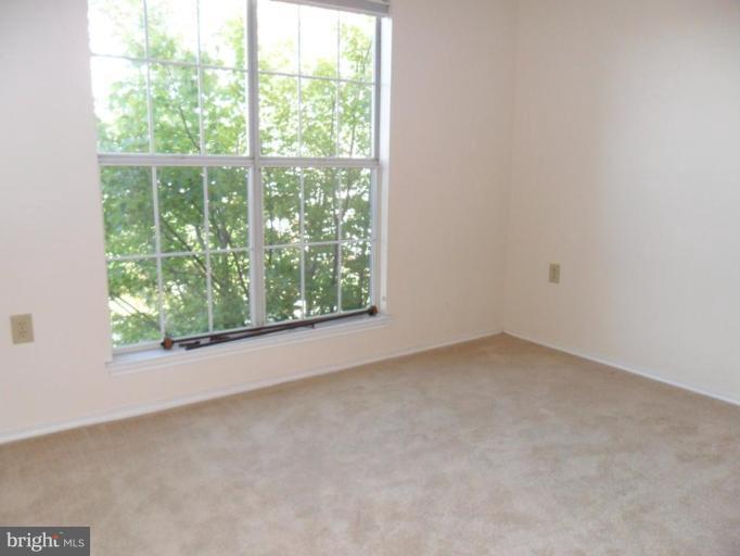 21013 Timber Ridge Terrace, Unit 301 Ashburn, VA 20147 - Photo 8 of 9 Bedroom #1