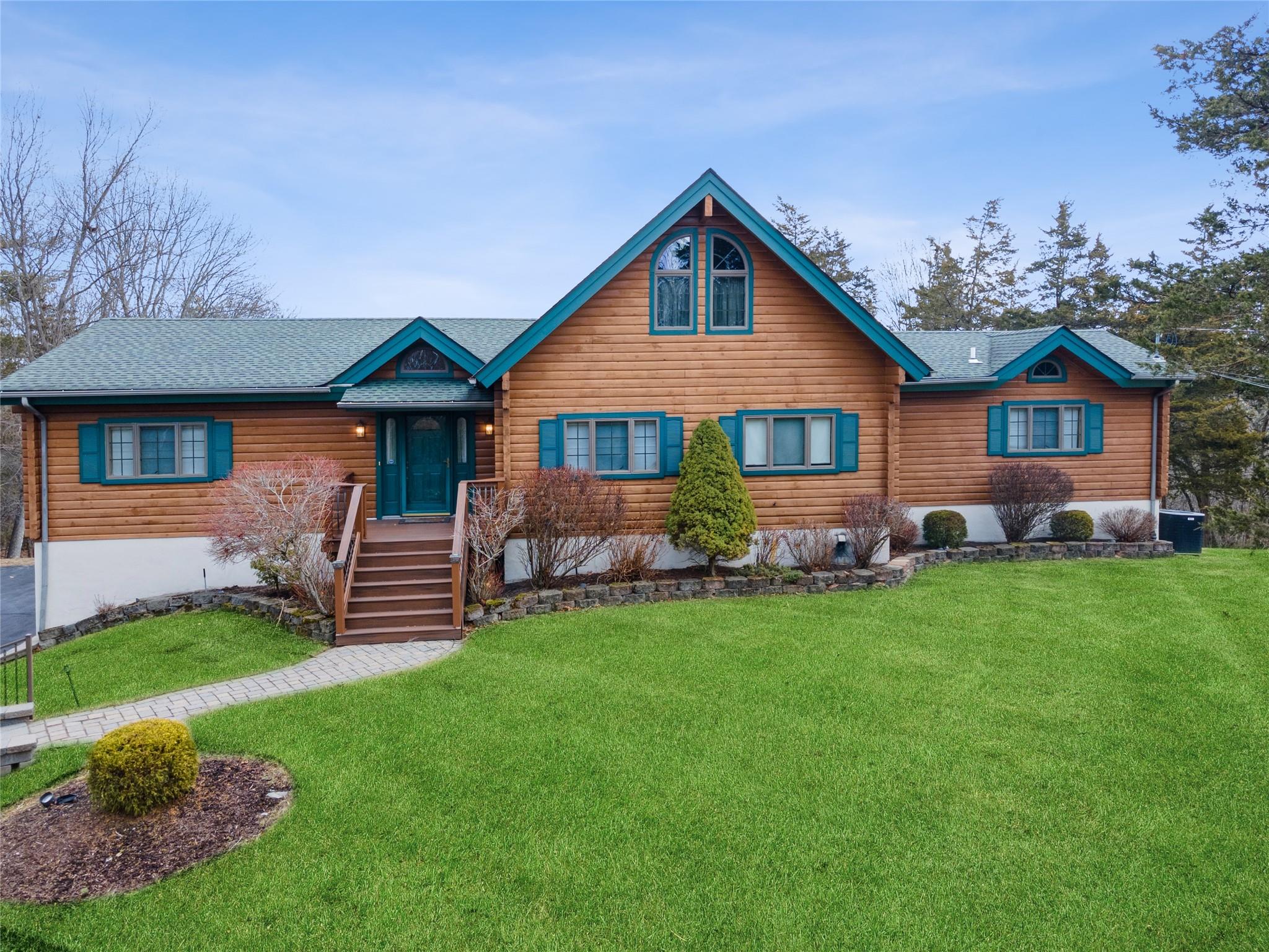 21 Belcher Road Warwick, NY 10990 - Photo 1 of 1 View of front facade featuring a front yard and roof with shingles