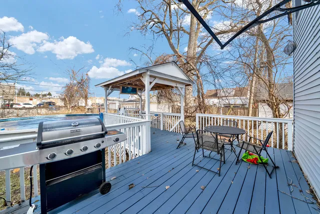a view of a chairs and table on the wooden floor