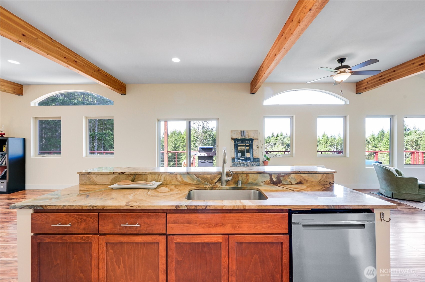 83 Octopus Court Quilcene, WA 98376 - Photo 12 of 40 a kitchen with center island and large windows