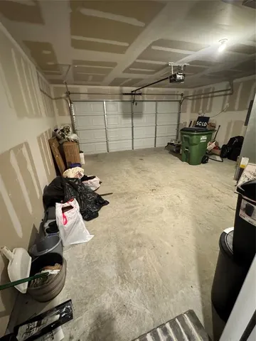 a view of a lake with a houses in the background