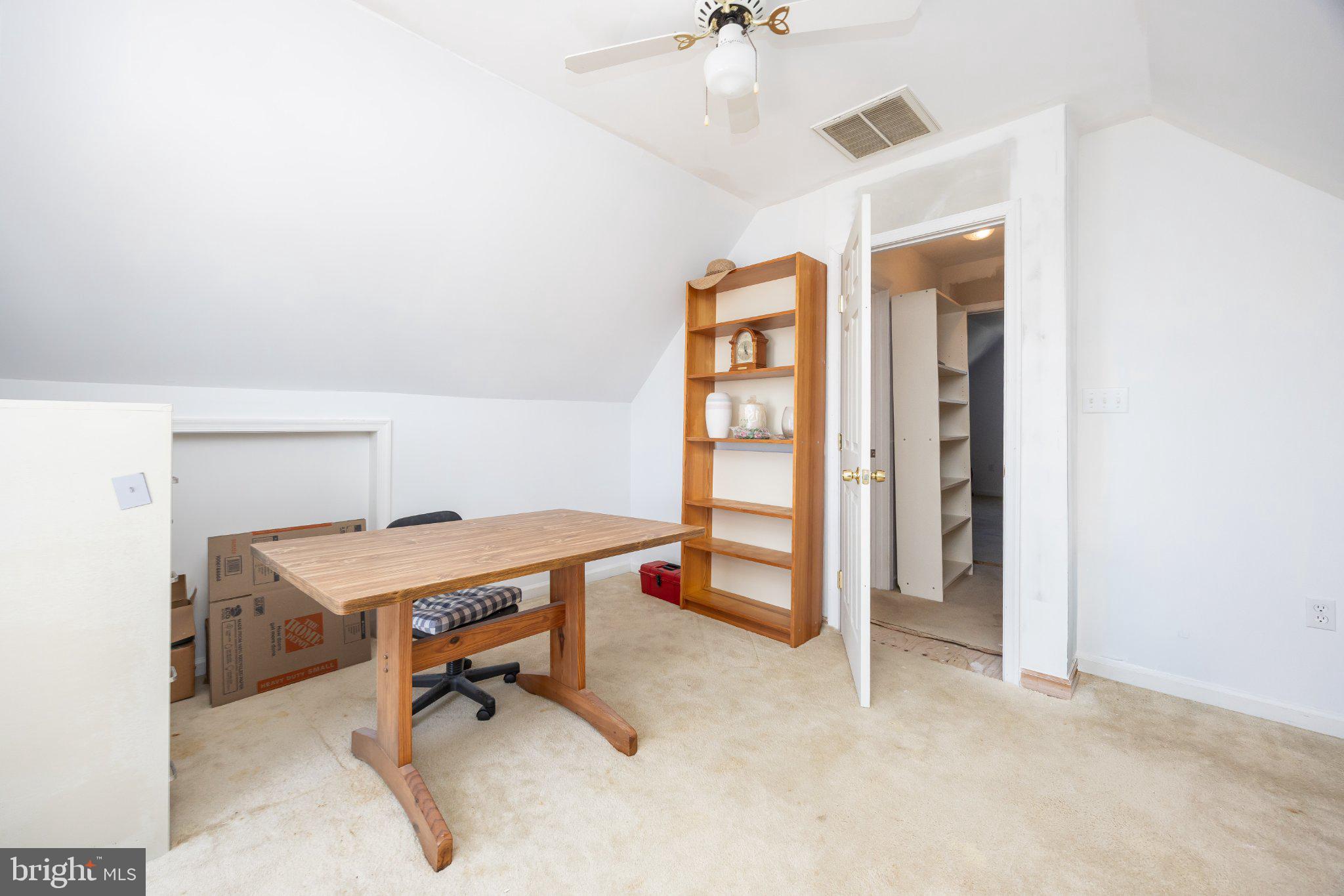 10431 Brighton Road Ocean City, MD 21842 - Photo 17 of 39 Bright and airy attic workspace.