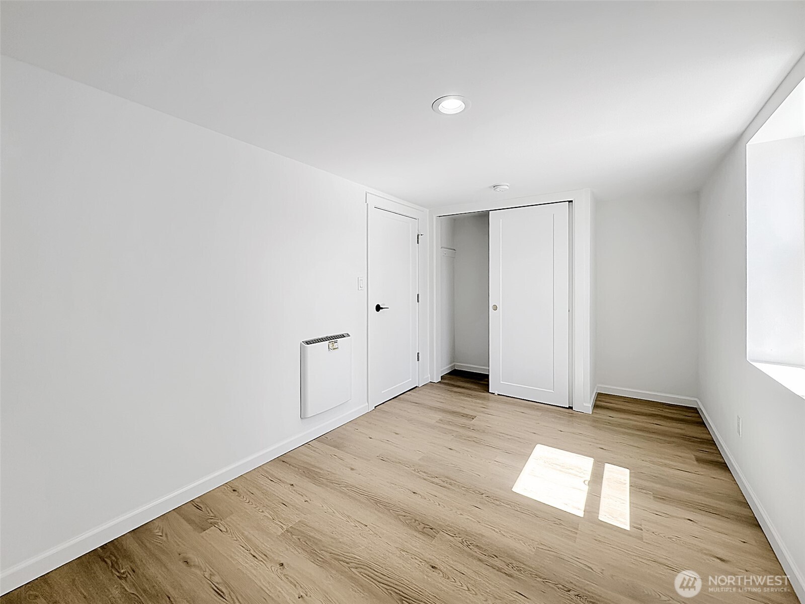 7403 Beverly Boulevard Everett, WA 98203 - Photo 16 of 19 an empty room with wooden floor