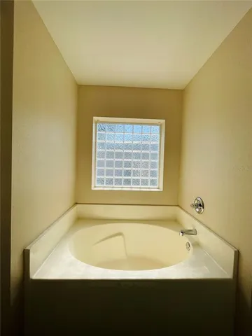 a bathroom with a bathtub