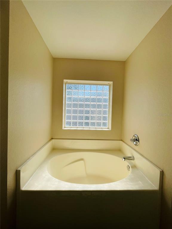 117 Angol Street Punta Gorda, FL 33983 - Photo 12 of 20 a bathroom with a bathtub