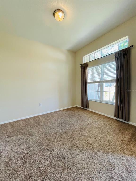 117 Angol Street Punta Gorda, FL 33983 - Photo 8 of 20 an empty room with a window