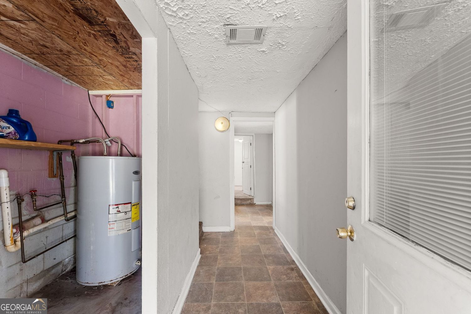 2346 4th Street Gainesville, GA 30504 - Photo 23 of 36 a view of a hallway with shelves