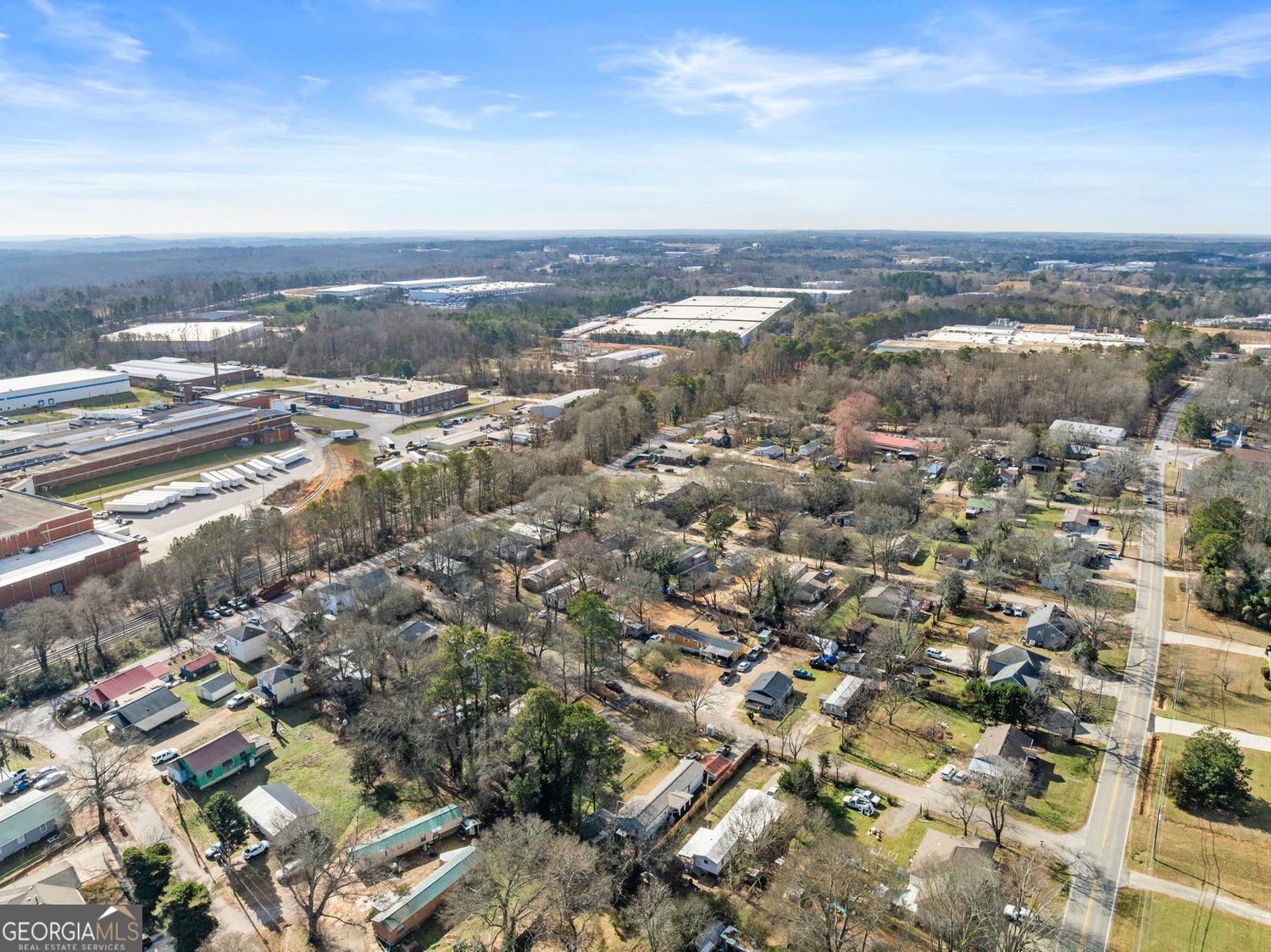 2346 4th Street Gainesville, GA 30504 - Photo 32 of 36 an aerial view of residential building with parking space
