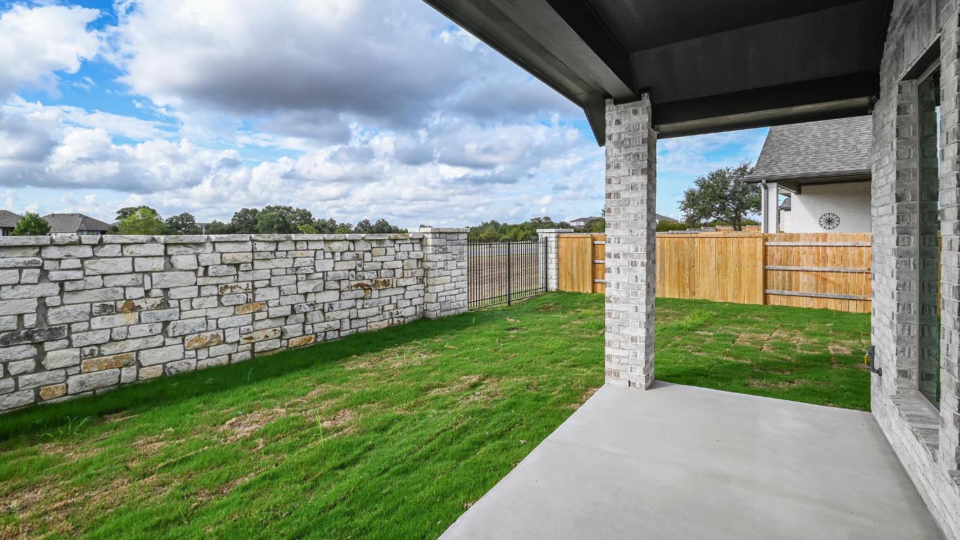 444 Prickly Poppy Loop Kyle, TX 78640 - Photo 21 of 40 Fenced backyard featuring a patio area