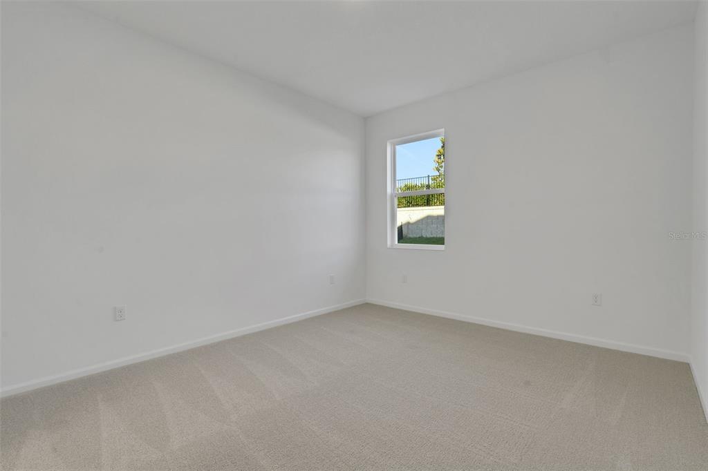 2824 Doolittle Street Tavares, FL 32778 - Photo 14 of 32 an empty room with a window