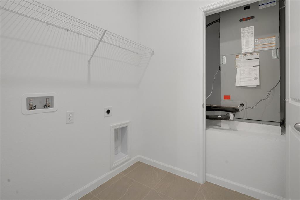 2824 Doolittle Street Tavares, FL 32778 - Photo 22 of 32 a bathroom with a sink