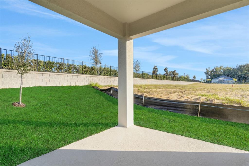 2824 Doolittle Street Tavares, FL 32778 - Photo 32 of 32 a view of a lake with a big yard