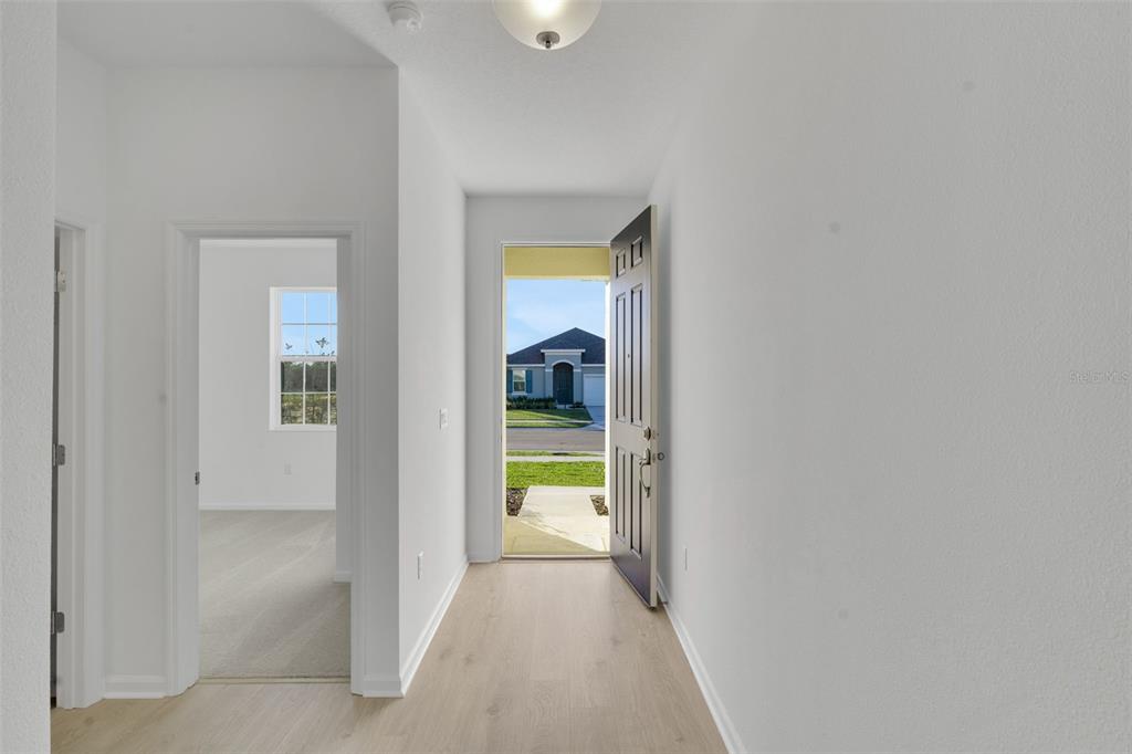 2824 Doolittle Street Tavares, FL 32778 - Photo 8 of 32 a view of an entryway and an empty room