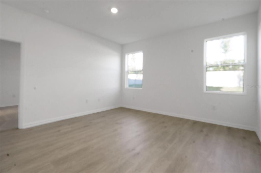 2824 Doolittle Street Tavares, FL 32778 - Photo 10 of 32 an empty room with a window