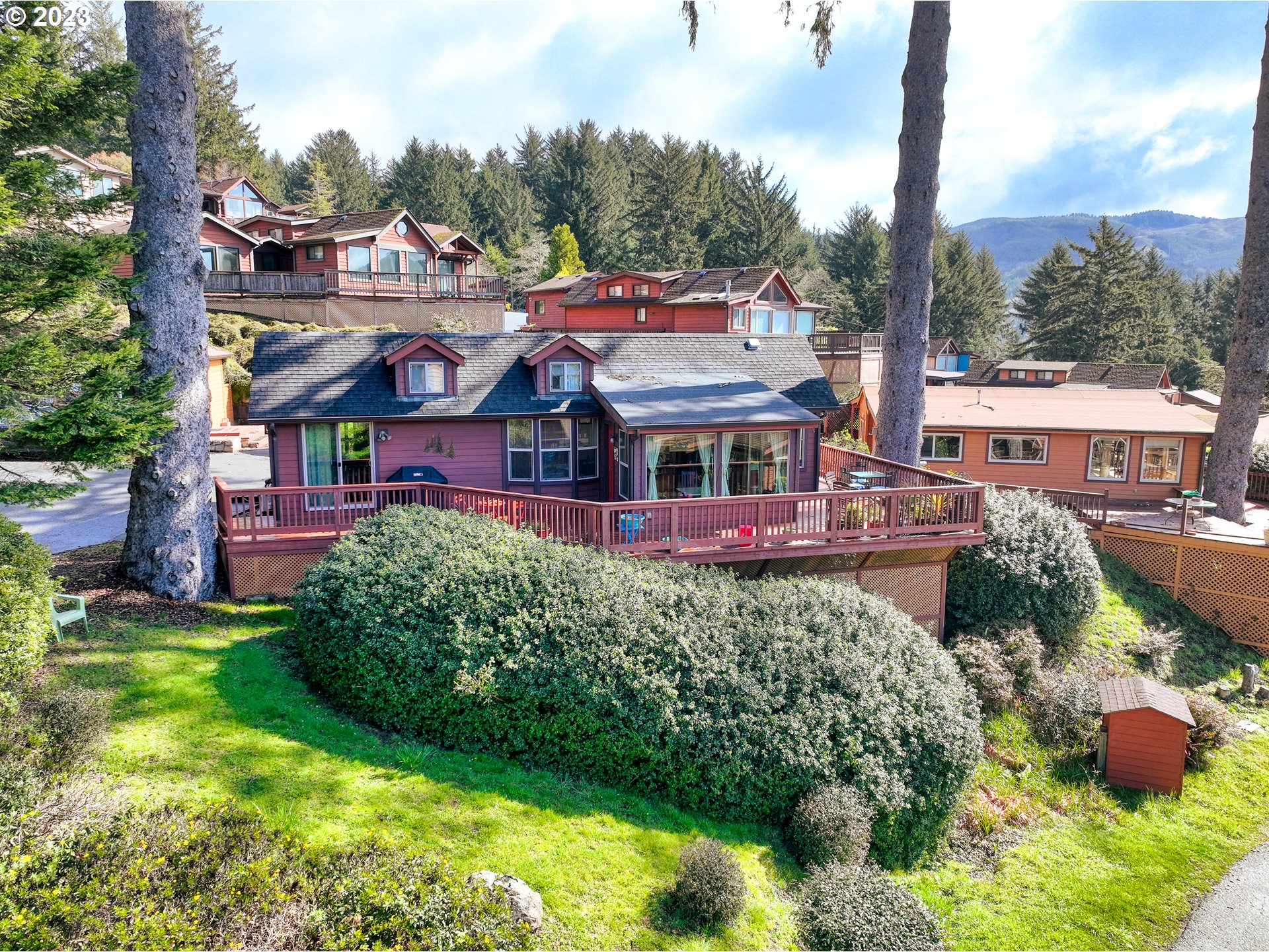 front view of a house with a yard