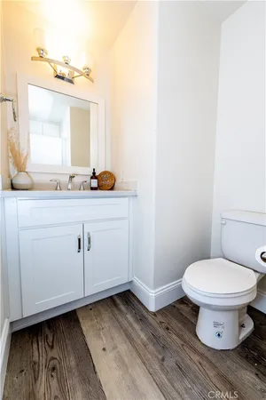 a bathroom with a toilet and a sink