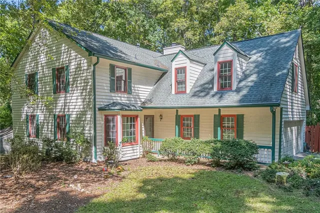 front view of a house with a yard
