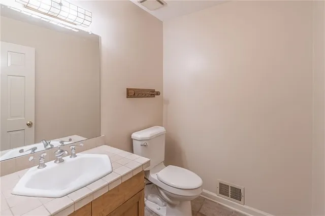 a bathroom with a sink and a toilet