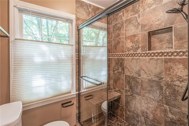a bath room with a window