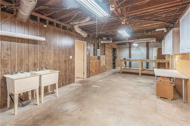 a view of a kitchen with furniture and a kitchen