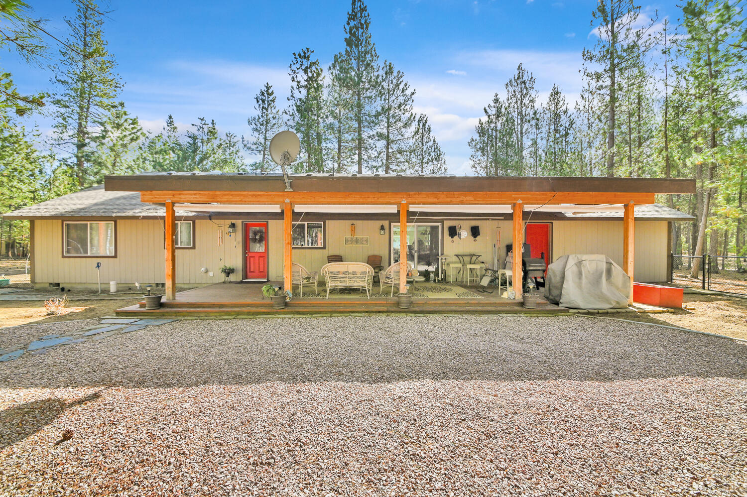 14840 Laurel Road La Pine, OR 97739 - Photo 26 of 32 a view of a house with backyard and trees