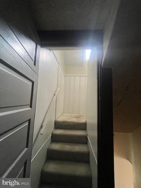 8 East Main Street, Unit MAIN Shiremanstown, PA 17011 - Photo 12 of 25 a view of staircase with lots of frames on wall