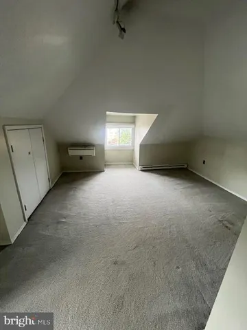 a view of a room with a window