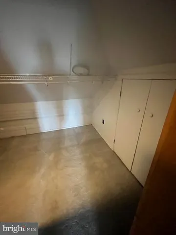 a view of a room with racks on the wall