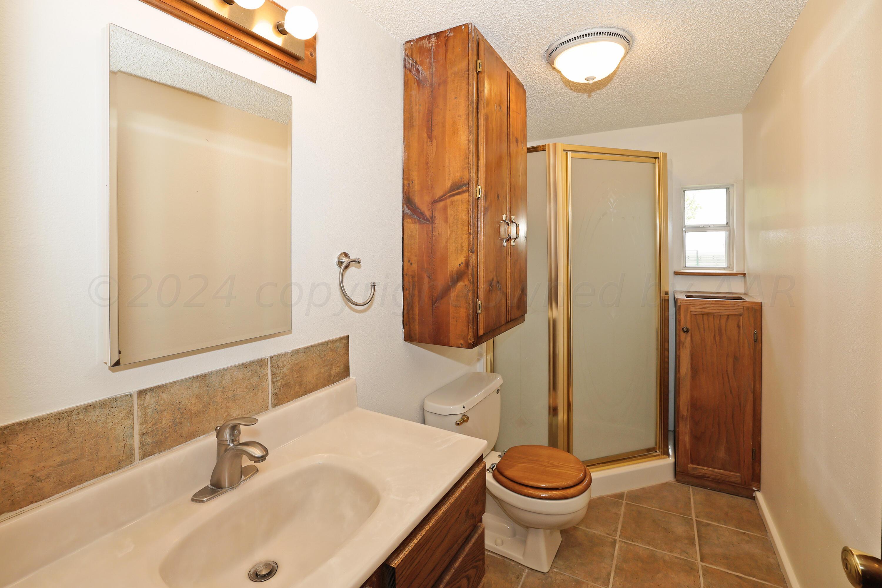 4045 South Fm 1258 (pullman) Amarillo, TX 79111 - Photo 34 of 45 Bathroom by 3rd & 4th Bedroom