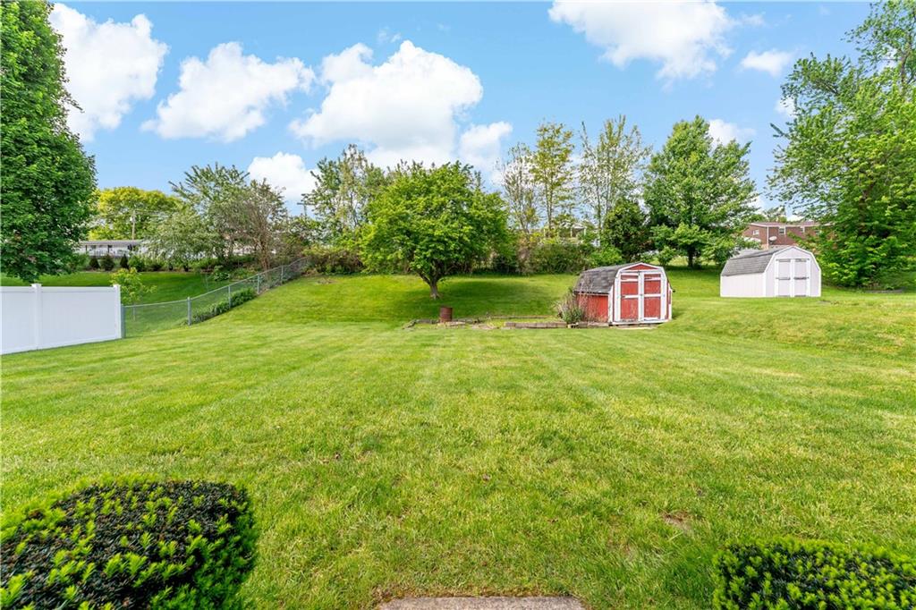 27 Dover Road Irwin, PA 15642 - Photo 33 of 43 a backyard of a house with lots of green space