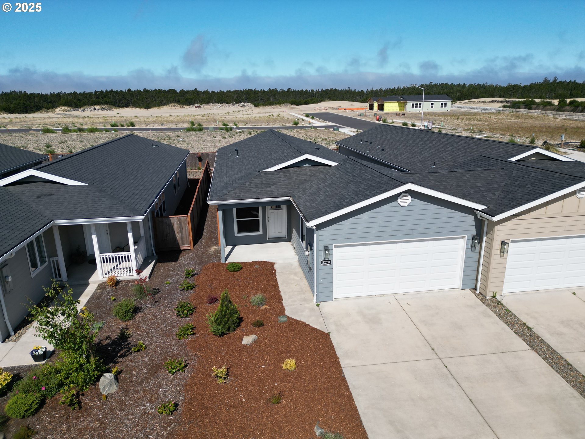 5270 Nopal Street Florence, OR 97439 - Photo 2 of 27 an aerial view of residential houses with outdoor space
