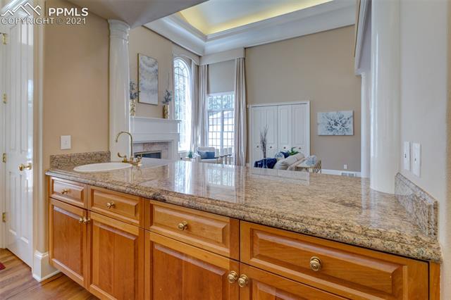 23 Pourtales Road Colorado Springs, CO 80906 - Photo 14 of 26 Beverage station located between kitchen and family room