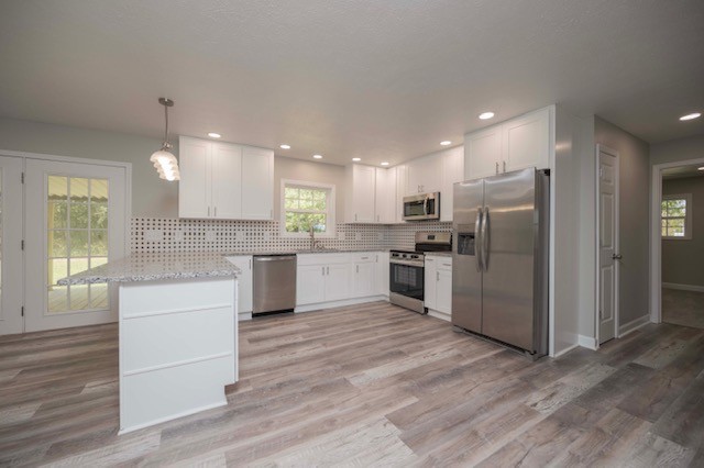 445 Pocahontas Road Morrison, TN 37357 - Photo 10 of 16 a kitchen with a refrigerator and a stove top oven