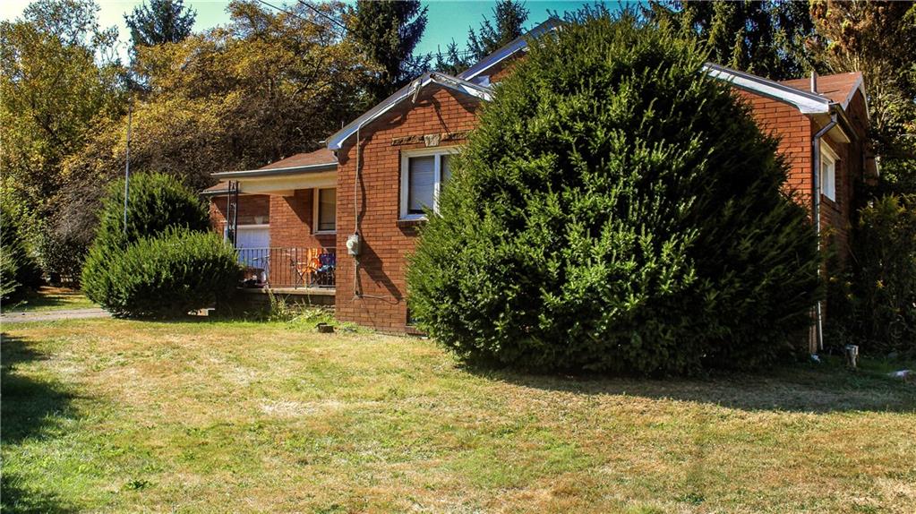 1638 Shady Drive Farrell, PA 16121 - Photo 3 of 21 a view of a house with a yard