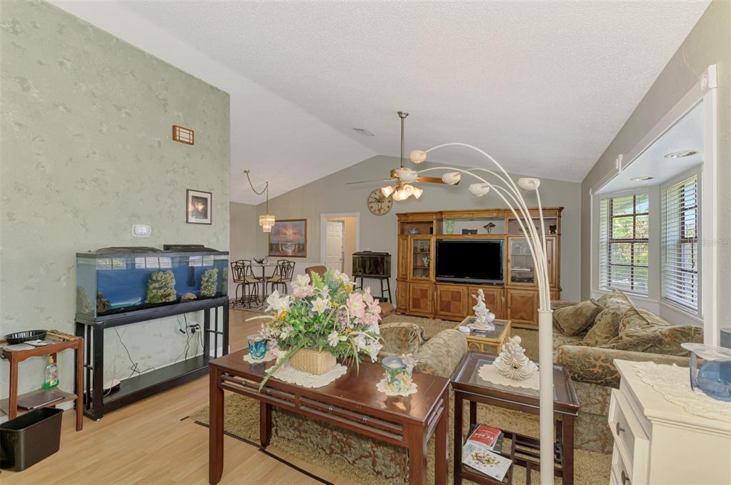 1137 Ponderosa Road Venice, FL 34293 - Photo 6 of 48 a view of a livingroom with furniture and window