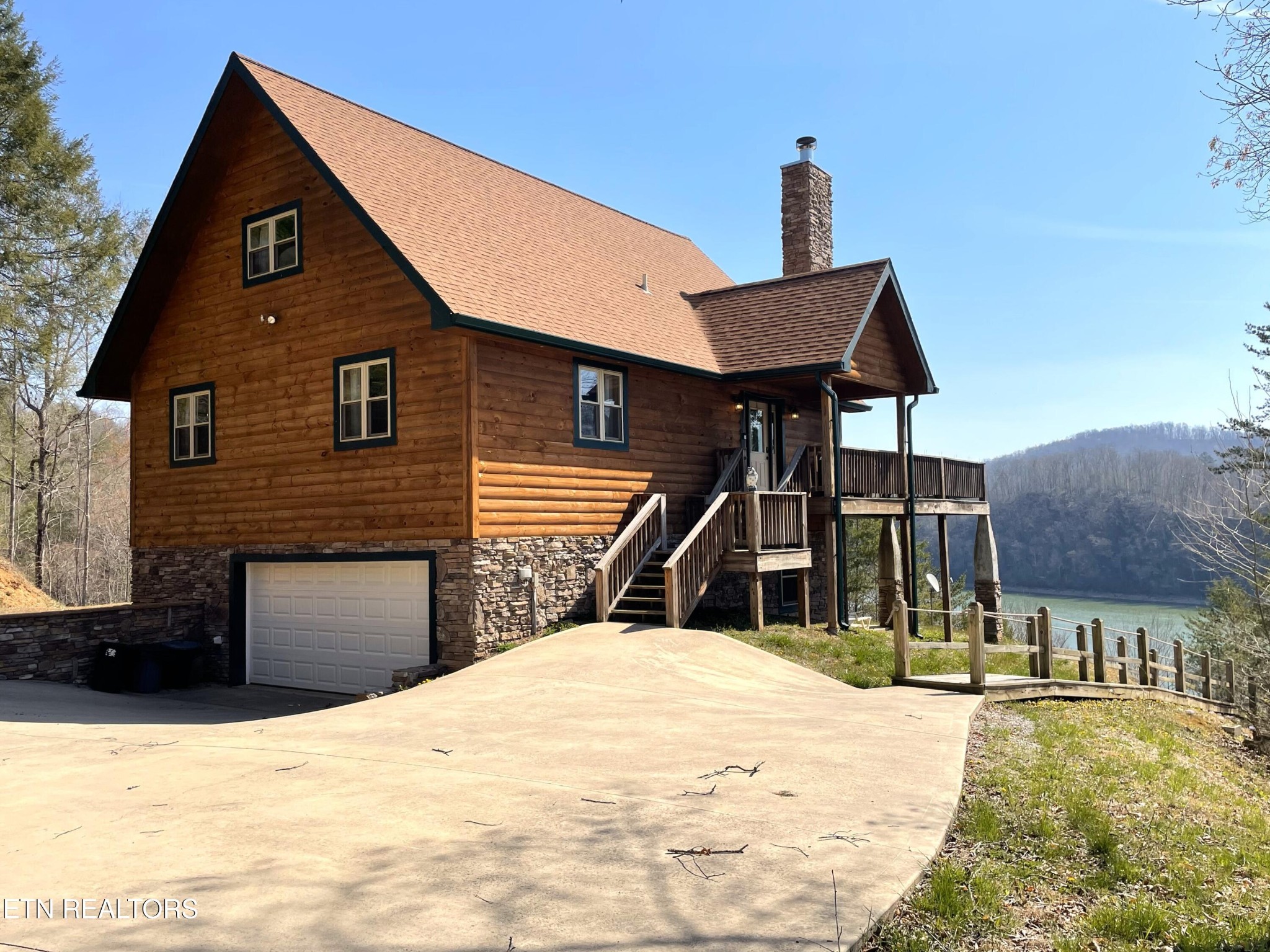 625 Bluff View Road New Tazewell, TN 37825 - Photo 2 of 57 a view of a house with a roof deck