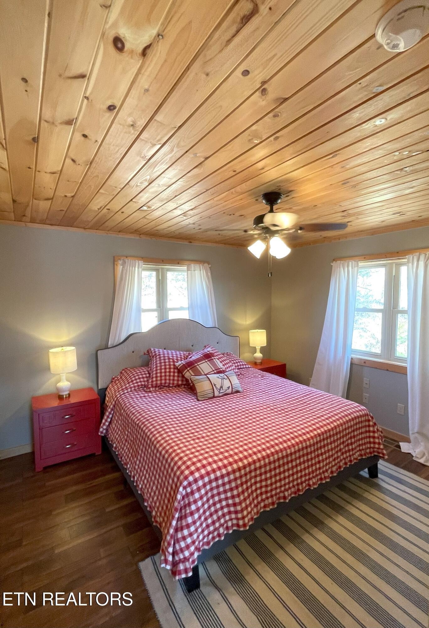 625 Bluff View Road New Tazewell, TN 37825 - Photo 24 of 57 a bedroom with a bed and window