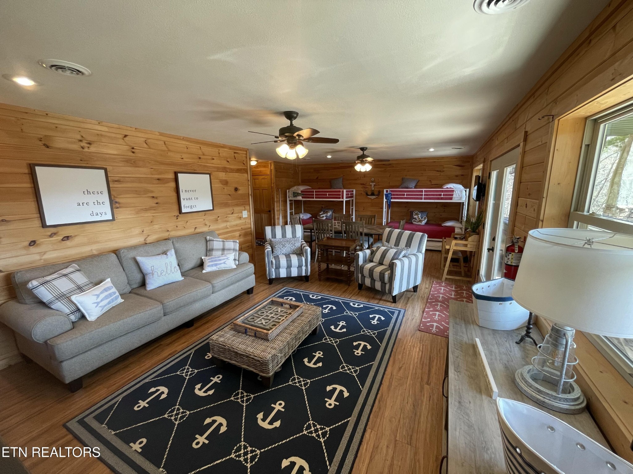 625 Bluff View Road New Tazewell, TN 37825 - Photo 27 of 57 a living room with furniture and wooden floor