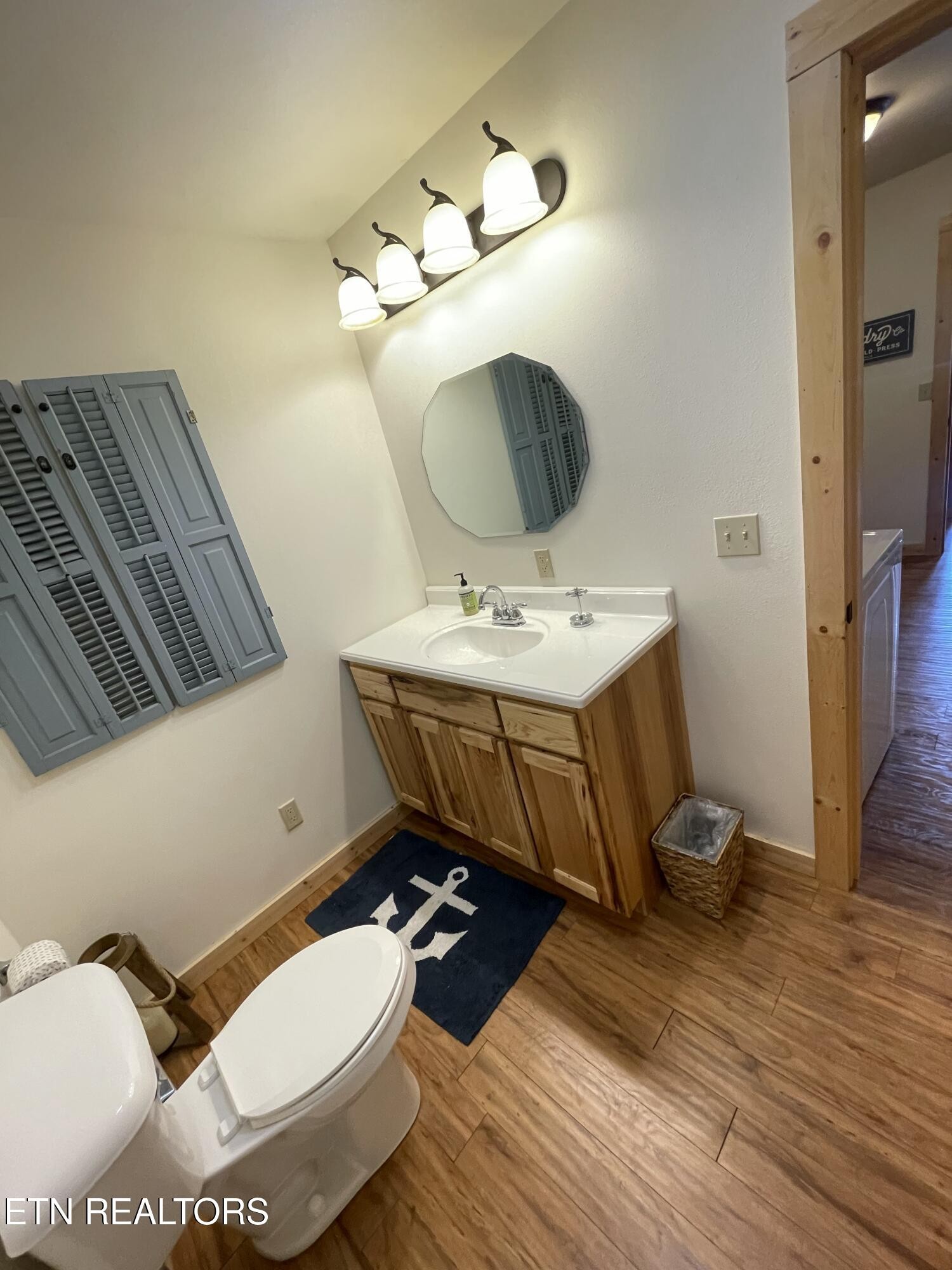 625 Bluff View Road New Tazewell, TN 37825 - Photo 35 of 57 a bathroom with a sink and a mirror