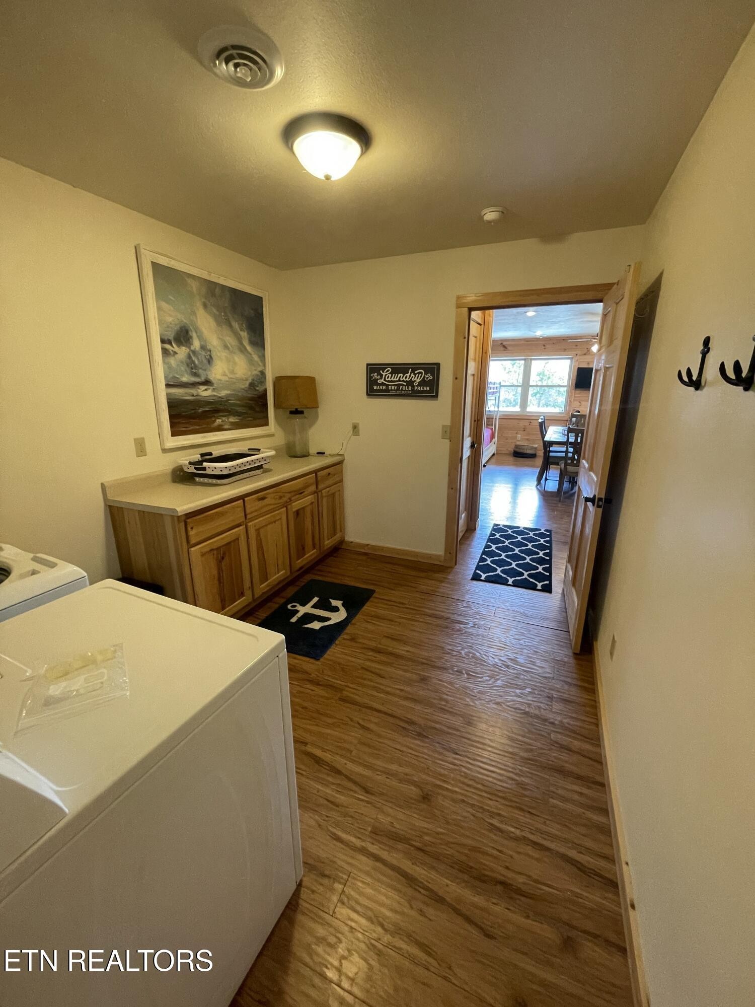 625 Bluff View Road New Tazewell, TN 37825 - Photo 36 of 57 a kitchen with a stove and wooden floor