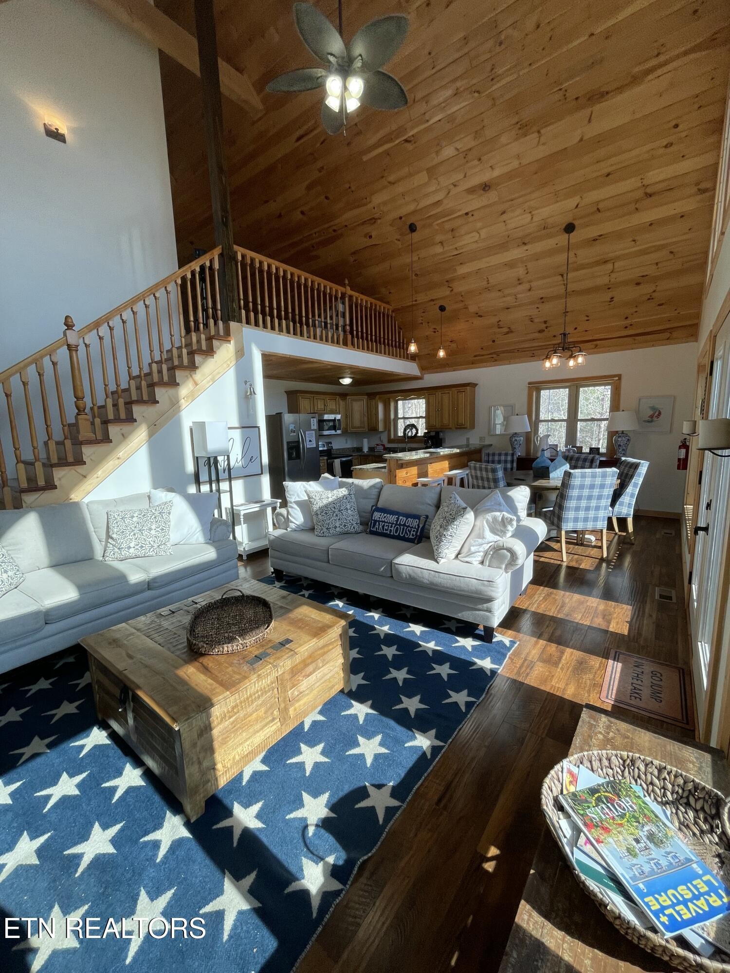 625 Bluff View Road New Tazewell, TN 37825 - Photo 4 of 57 a living room with lots of furniture and a rug