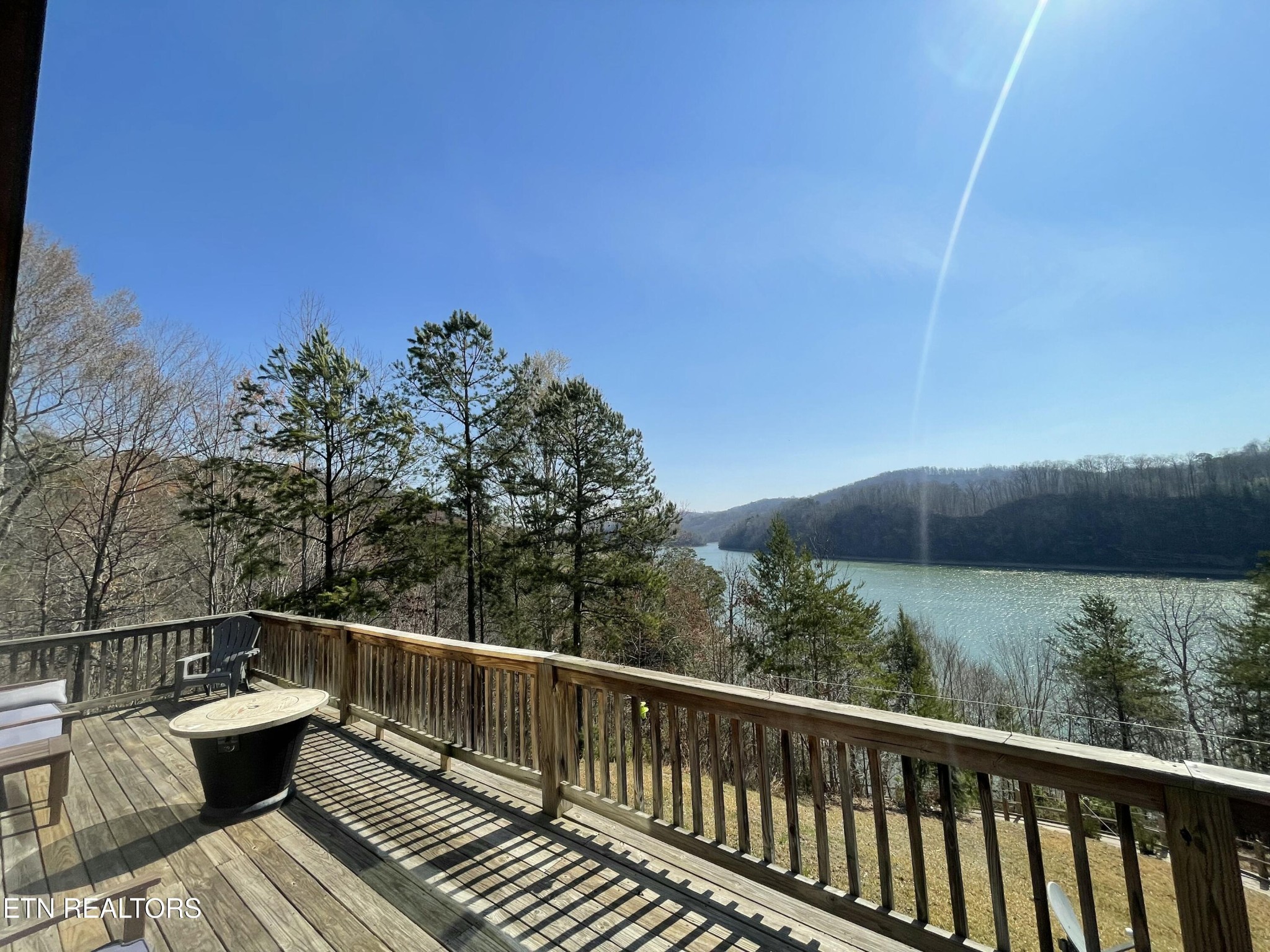 625 Bluff View Road New Tazewell, TN 37825 - Photo 41 of 57 a view of a balcony with wooden floor and outdoor space