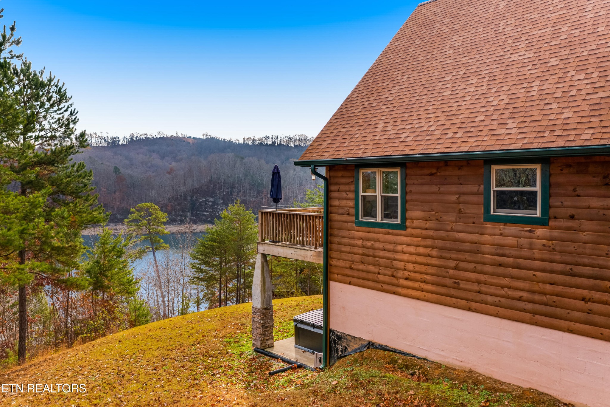 625 Bluff View Road New Tazewell, TN 37825 - Photo 52 of 57 a view of a house with a yard