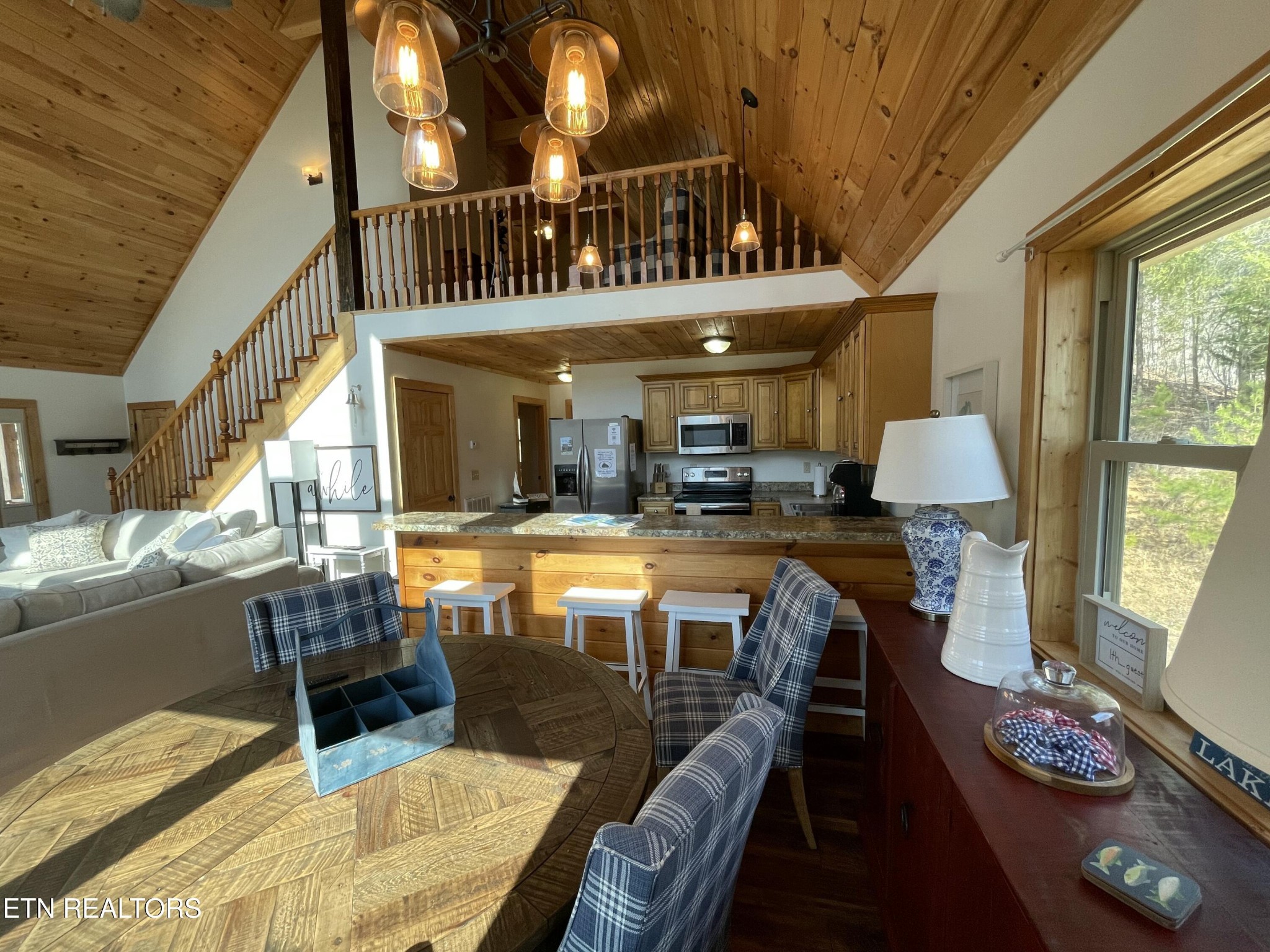 625 Bluff View Road New Tazewell, TN 37825 - Photo 7 of 57 a view of a livingroom with furniture window and wooden floor