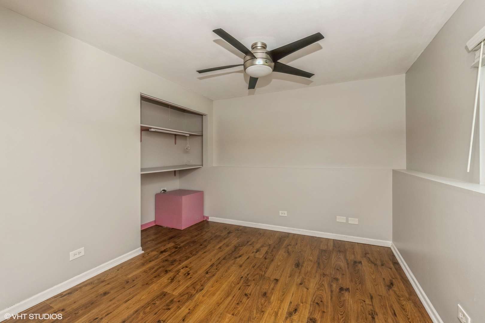 618 Hampton Circle Elgin, IL 60120 - Photo 9 of 18 an empty room with wooden floor and windows
