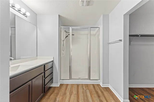 a view of a room with racks on the wall