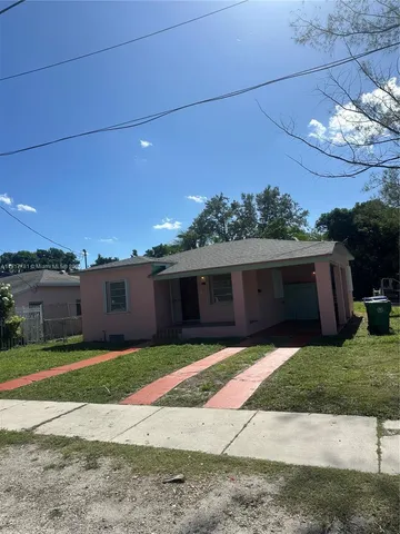 a view of a house with a patio
