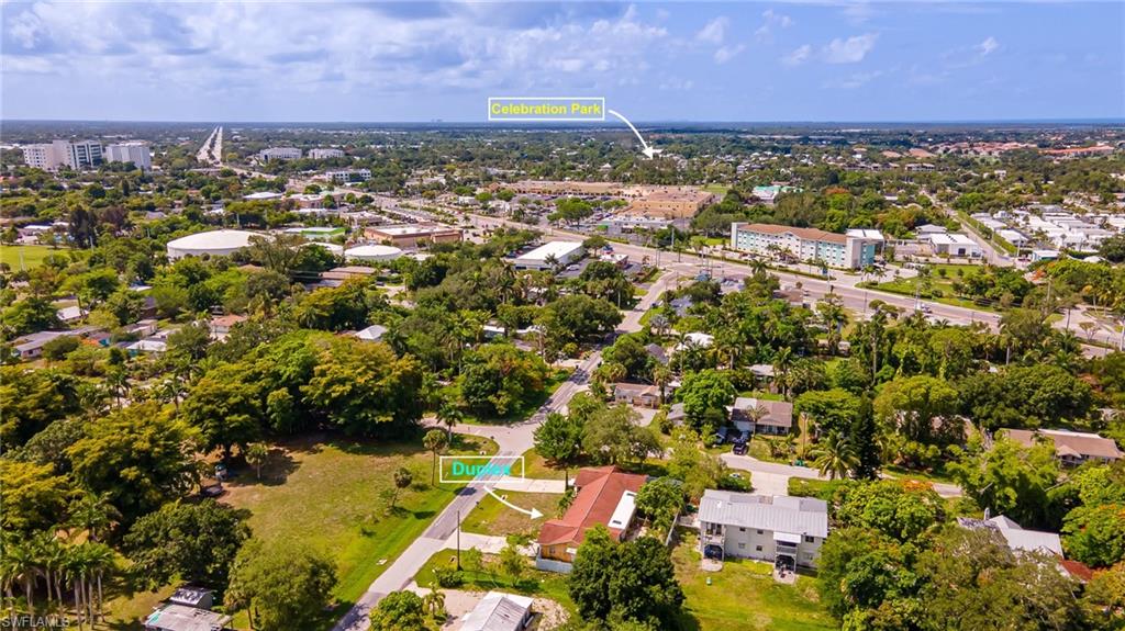 2080 Pelton Avenue Naples, FL 34112 - Photo 15 of 43 an aerial view of residential houses with outdoor space and trees
